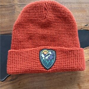 Rust Orange Knit Beanie with Mountain Patch
